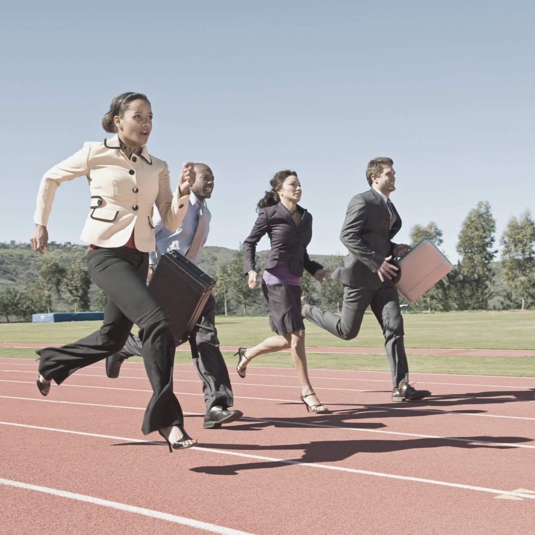 keep up with competitor content strategies: people in business attire running on a race track