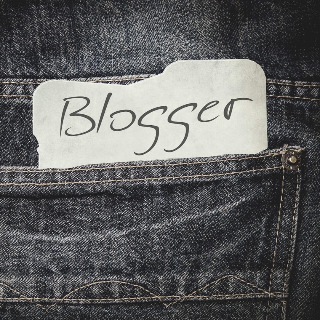 Article Ideas: Jeans back pocket with a slip of paper that says "blogger"