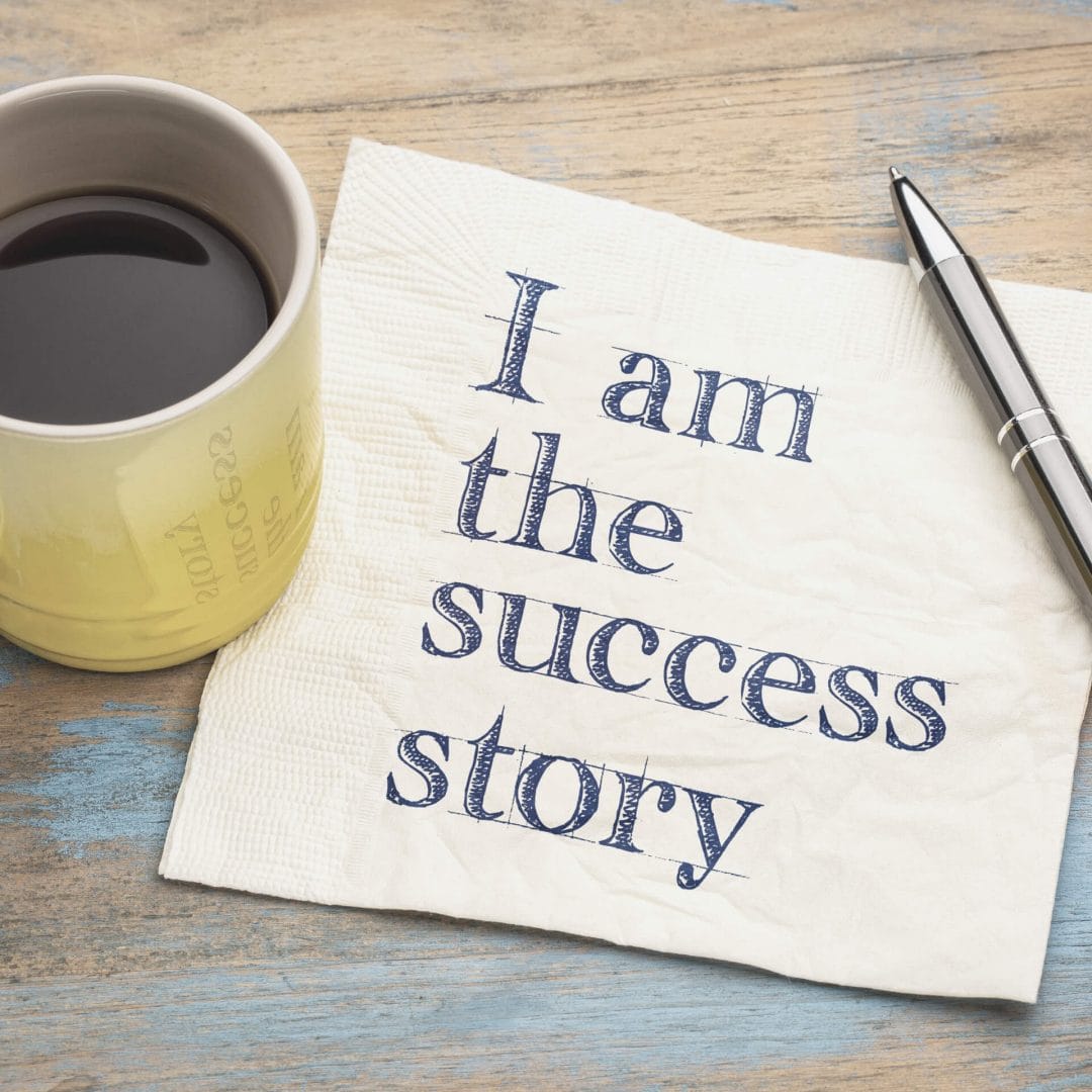 Digital Marketing Examples: Napkin with the text "I am the success story" next to a cup of coffee.