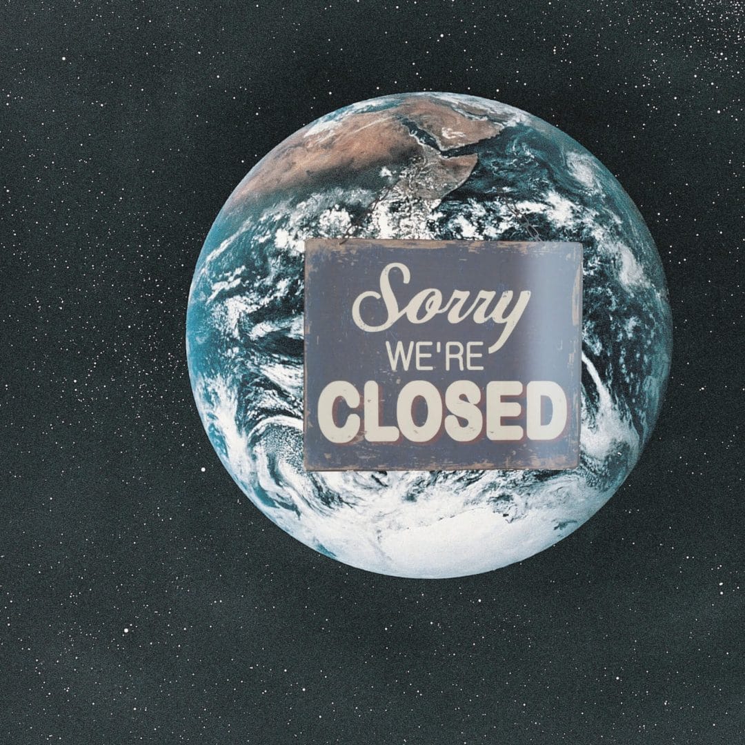 pandemic business marketing: The earth with a sorry we're closed" sign hanging on it.